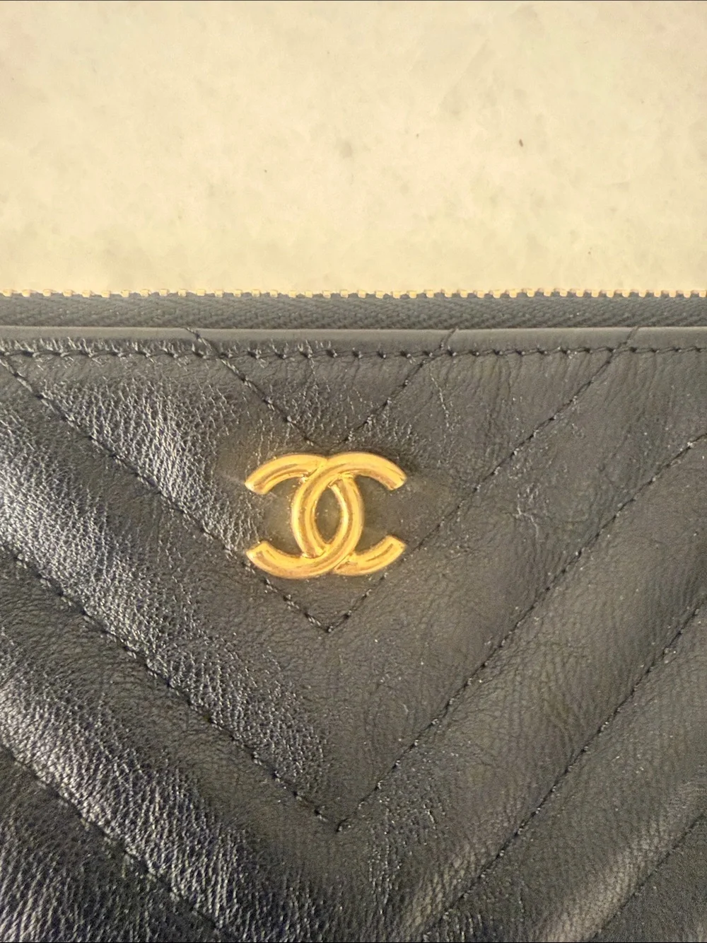 CHANEL Black Chevron Quilted Leather Zip Pouch with Gold CC